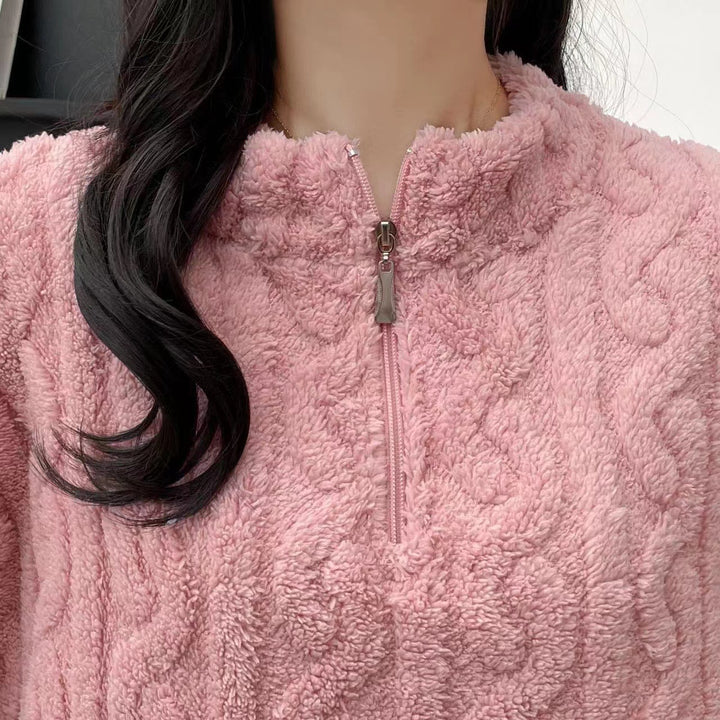 Rosa fleecepyjamas med halv dragkedja