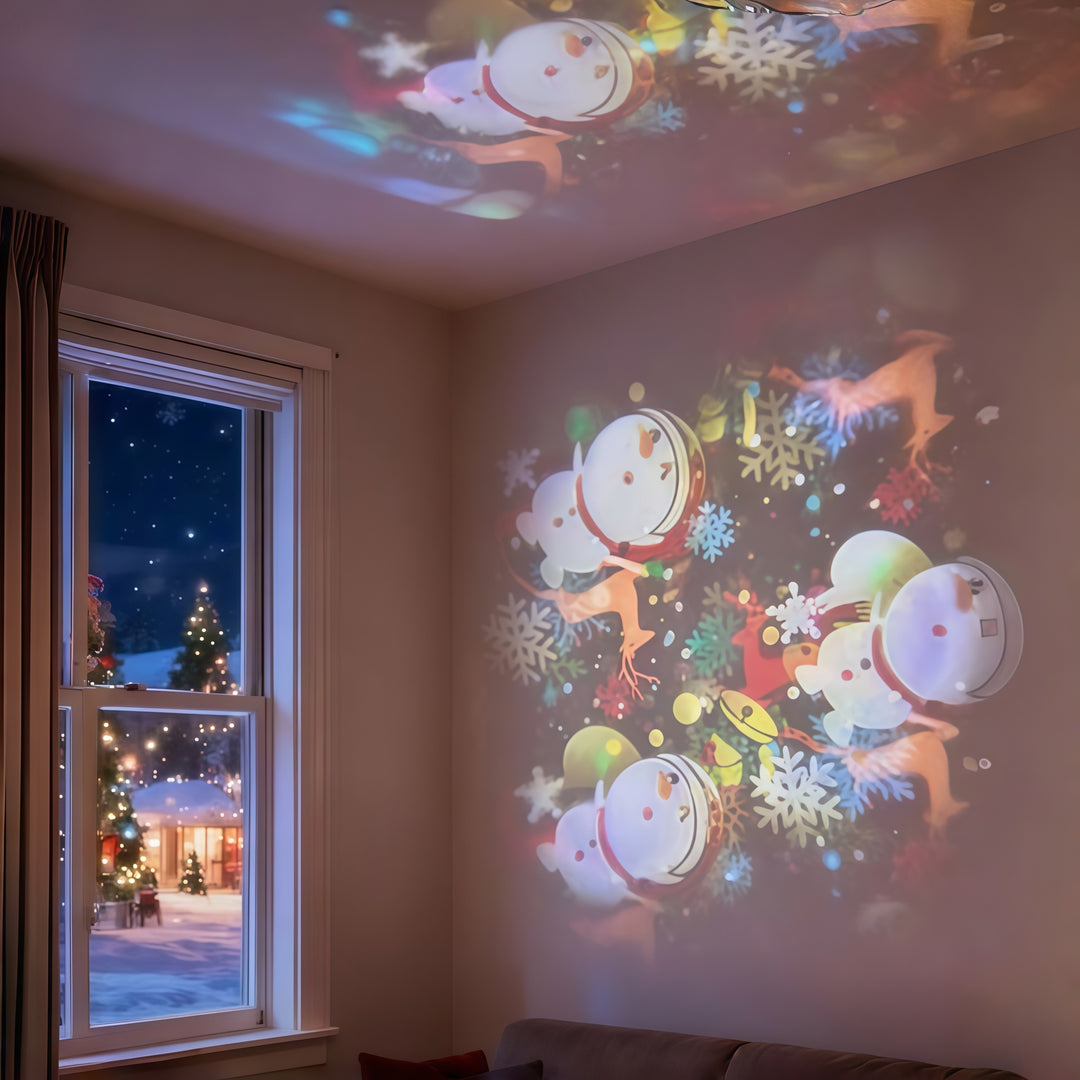 Projektorlampa som visar snöflingor på väggen