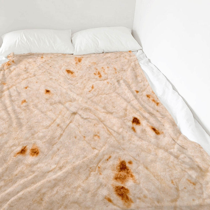 Rund tortillafilt på soffa