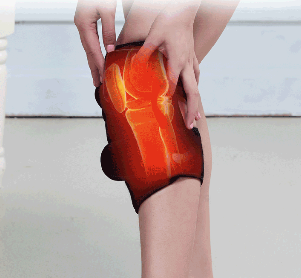 Svart värmebandage runt knät