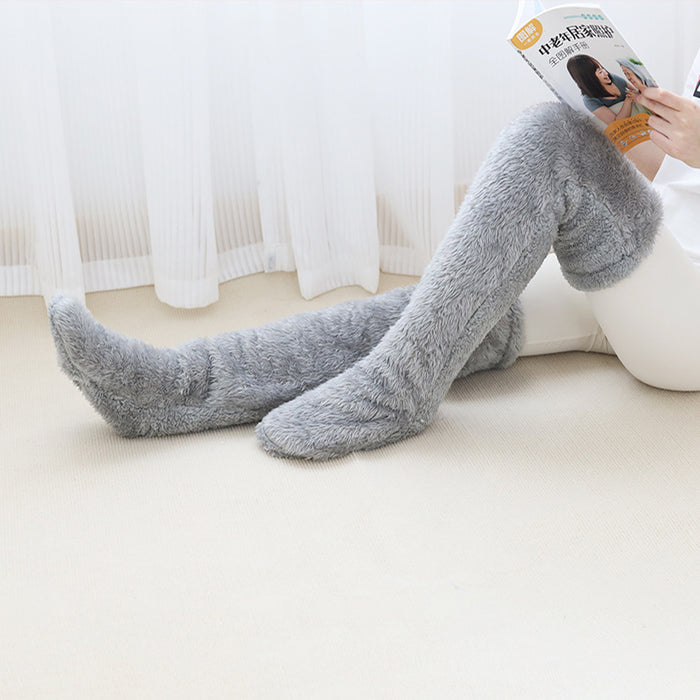 Värmekällan Lurviga overknee-sockor som värmer fot, vad och knä