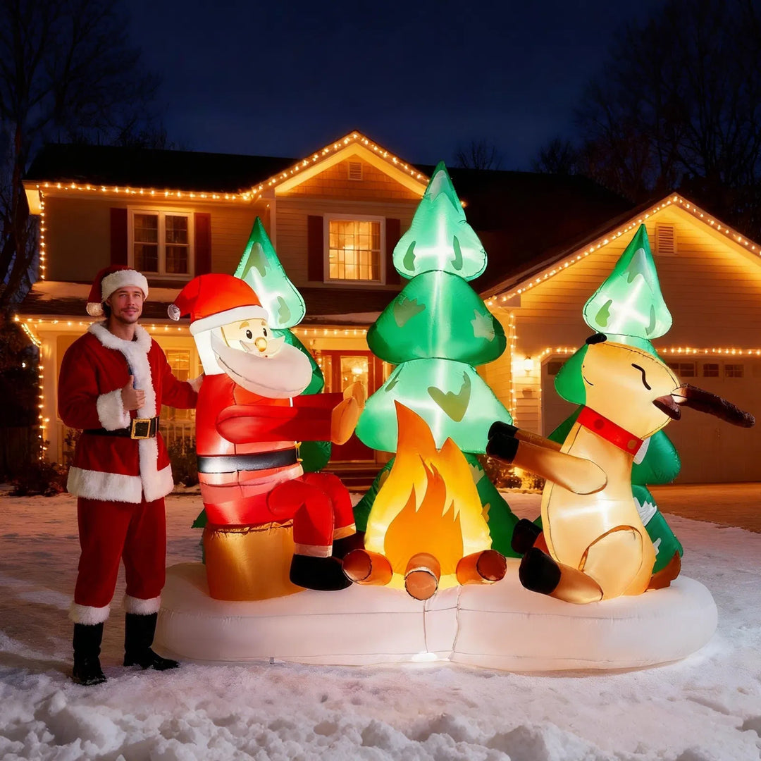 Uppblåsbar tomte och ren vid lägereld