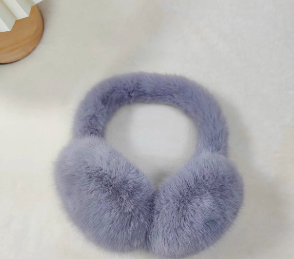 Fluffiga öronmuffar i rosa fuskpäls