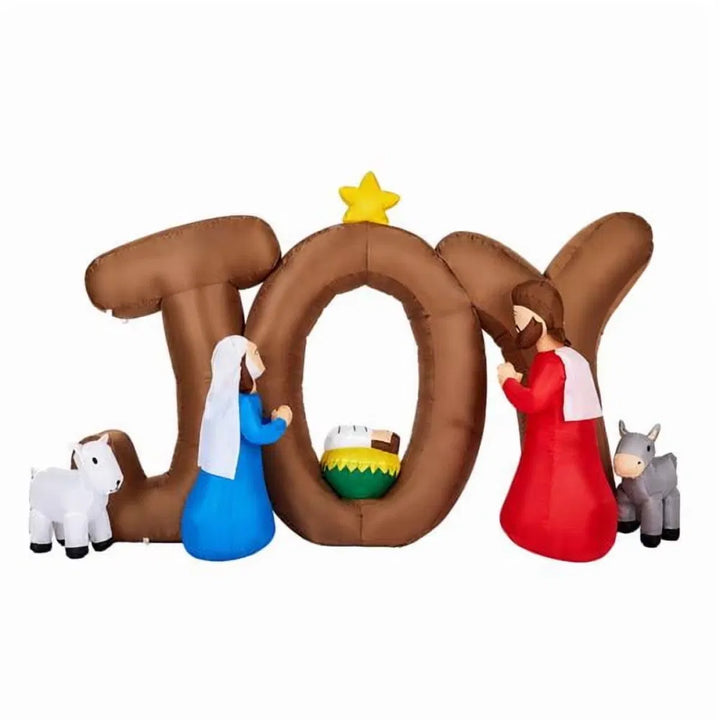 Uppblåsbar julkrubba med stora JOY-bokstäver