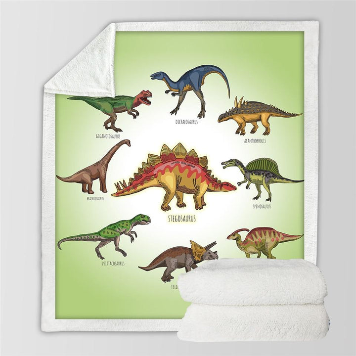 Barnfilt med dinosaurietryck på säng