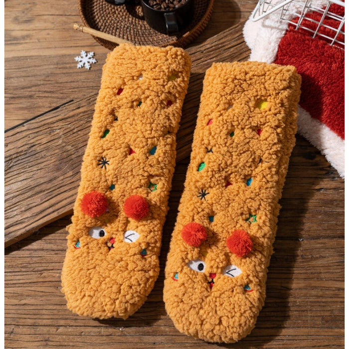 Värmekällan Fluffiga sockor med broderade ansikten och pompoms