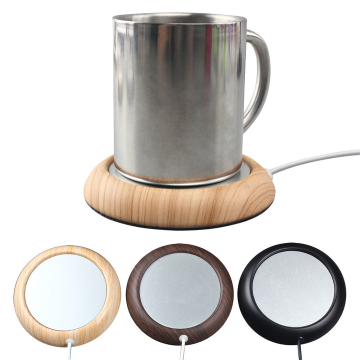 Koppvärmare med träkant och kaffemugg
