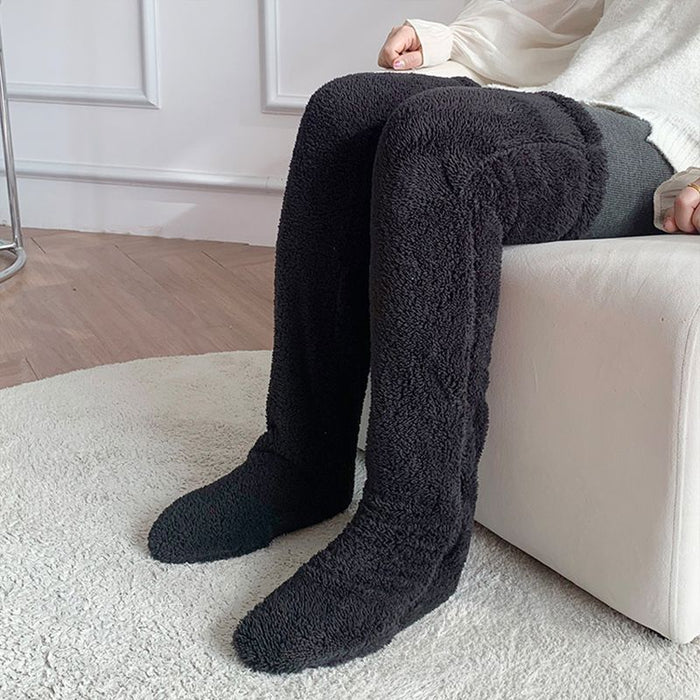 Värmekällan Lurviga overknee-sockor som värmer fot, vad och knä