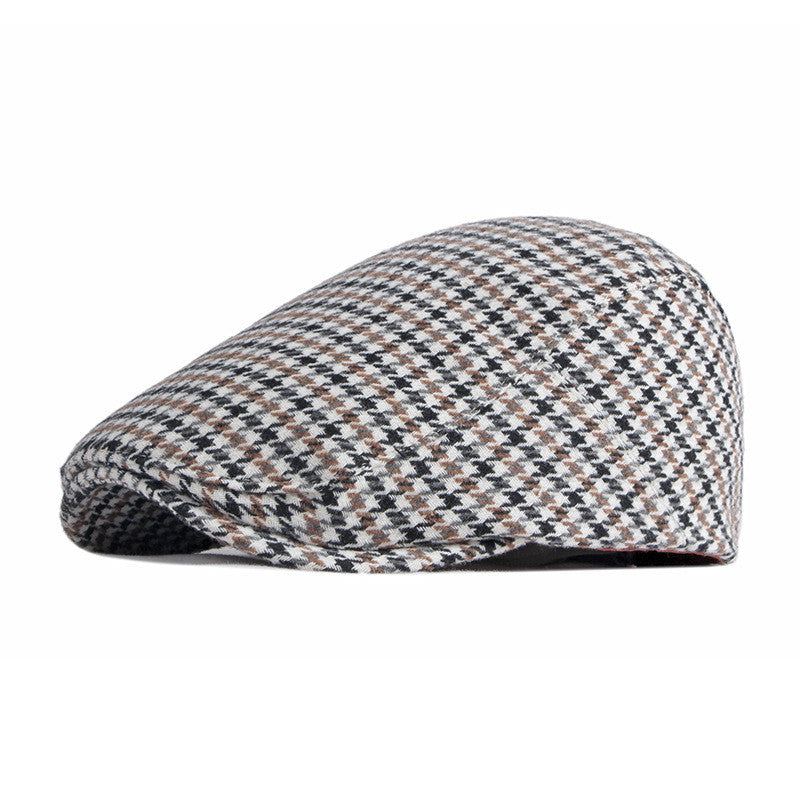 Hundtandsmönstrad sixpence i beige
