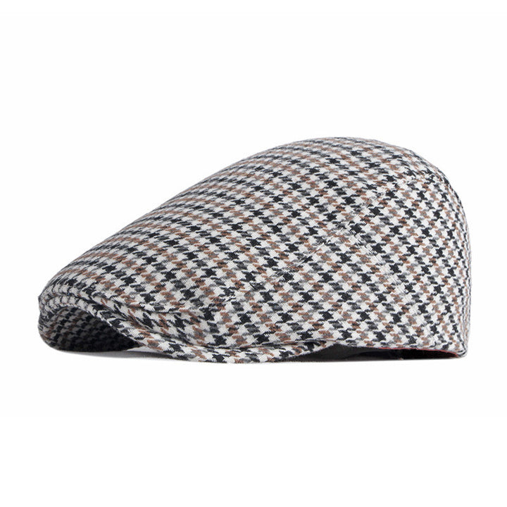 Hundtandsmönstrad sixpence i beige