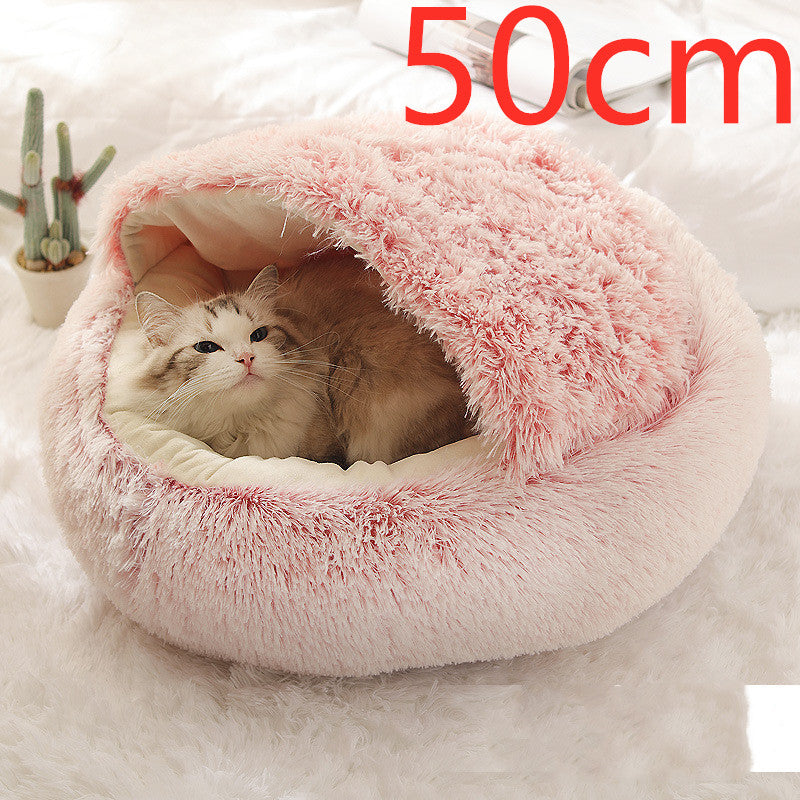 Katt i rund plyschbädd med huva