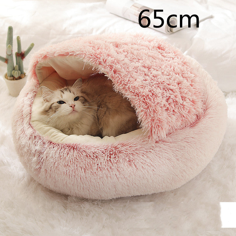 Katt i rund plyschbädd med huva