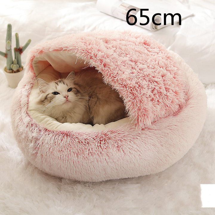 Katt i rund plyschbädd med huva