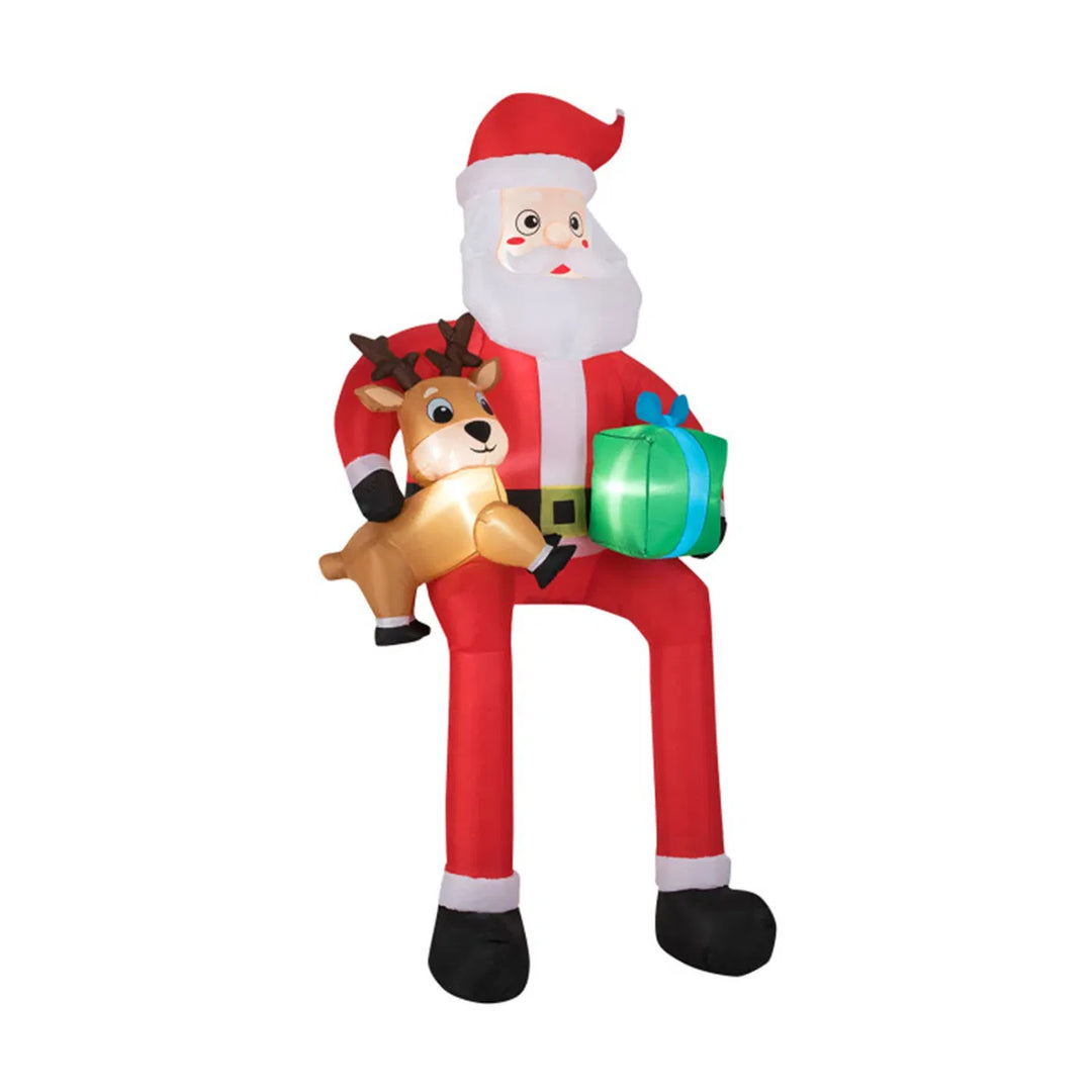 Stor uppblåsbar tomte med ren och paket