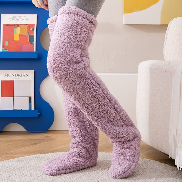 Värmekällan Lurviga overknee-sockor som värmer fot, vad och knä