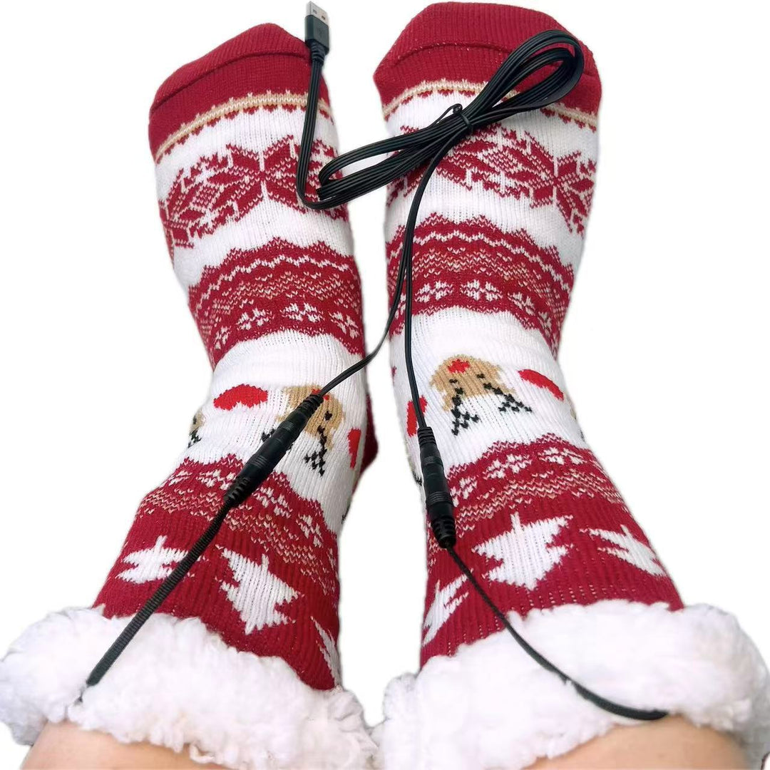 Stickade julsockor med renmönster och USB-kabel
