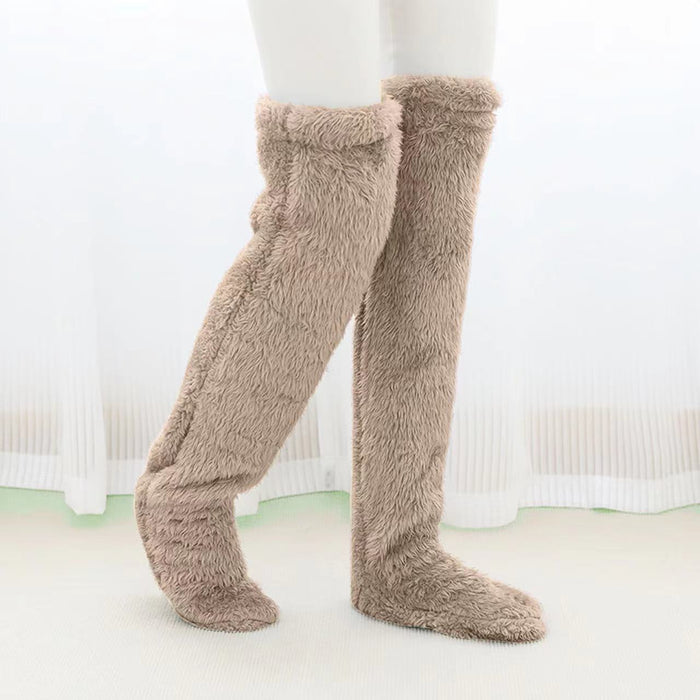 Värmekällan Lurviga overknee-sockor som värmer fot, vad och knä