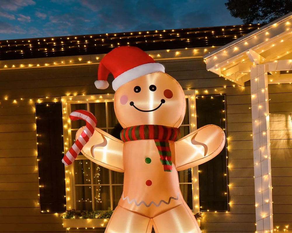 Uppblåsbar pepparkaksgubbe med polkagris