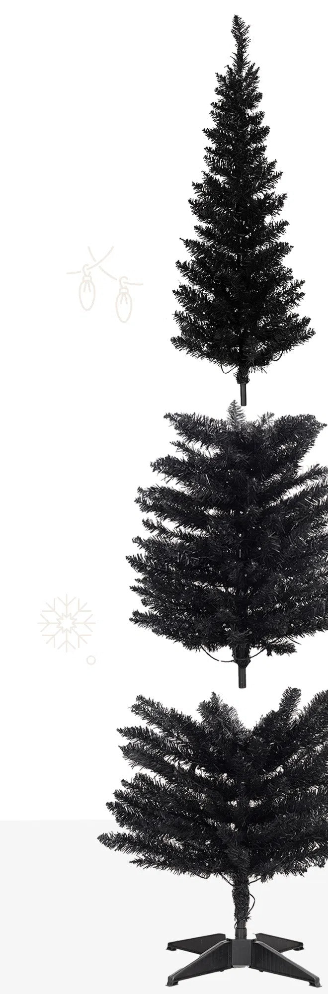 Svart smal julgran med varmvita ljus