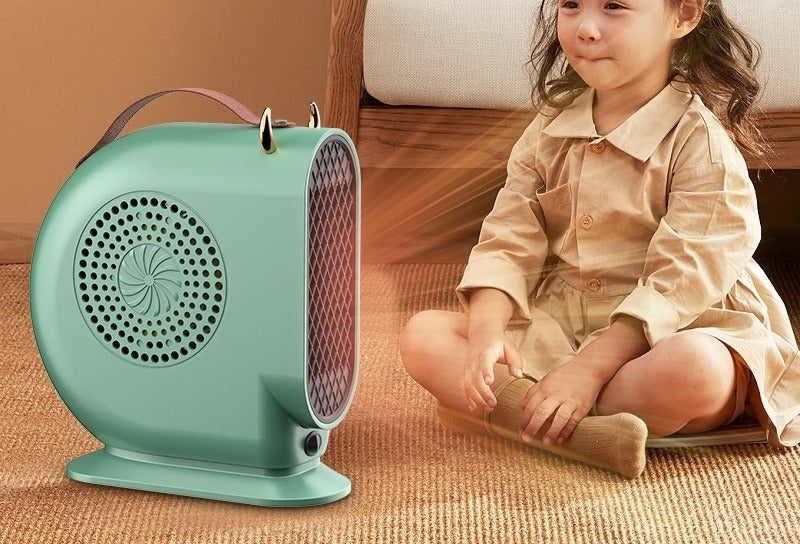 Liten olivgrön värmefläkt med handtag