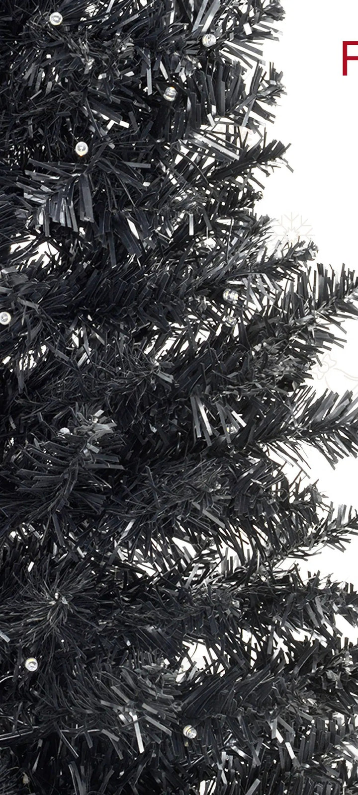 Svart smal julgran med varma ljus