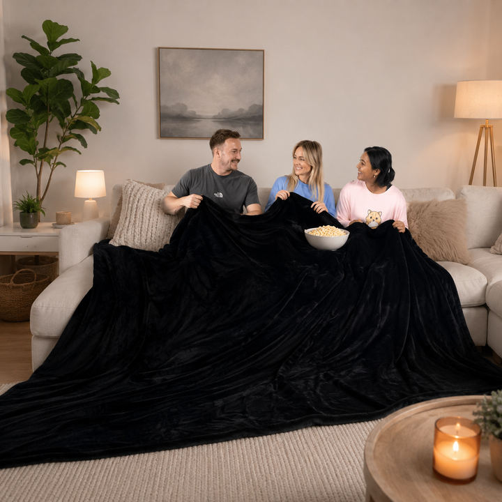 Värmekällan™ Extra stor mysfilt i plysch för hela familjen