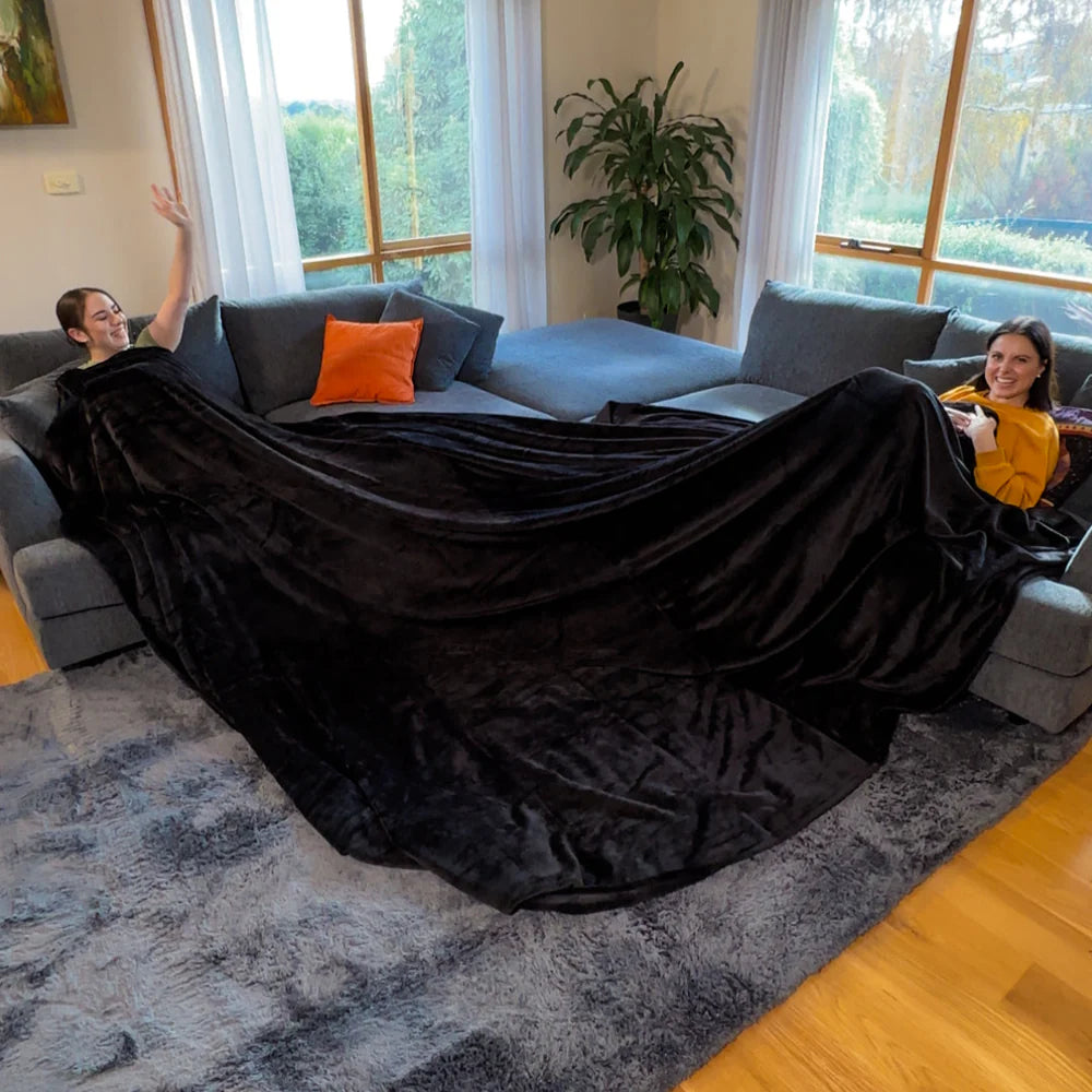 Värmekällan™ Extra stor mysfilt i plysch för hela familjen