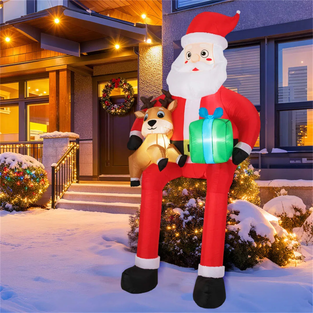 Stor uppblåsbar tomte med ren och paket