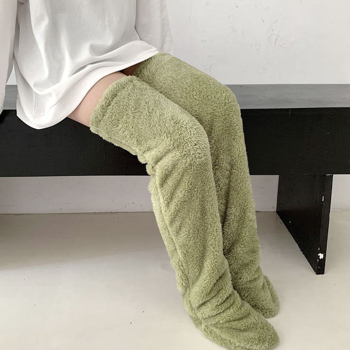 Lurviga overknee-sockor i ljuslila