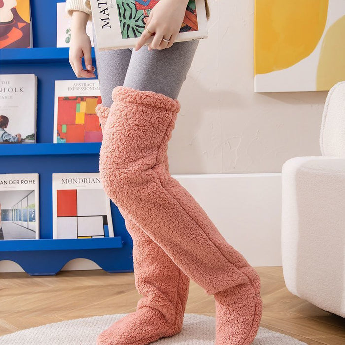 Värmekällan Lurviga overknee-sockor som värmer fot, vad och knä