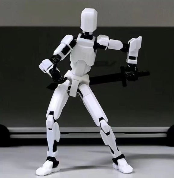 Orange 3D-printad robotfigur i pose