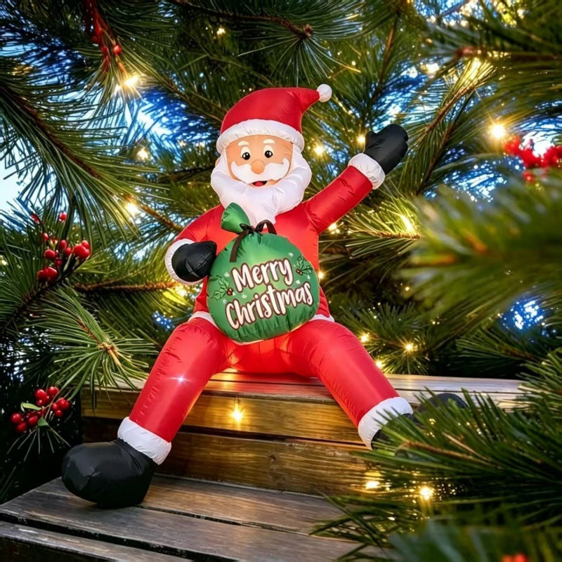 Stor uppblåsbar tomte i trädgård