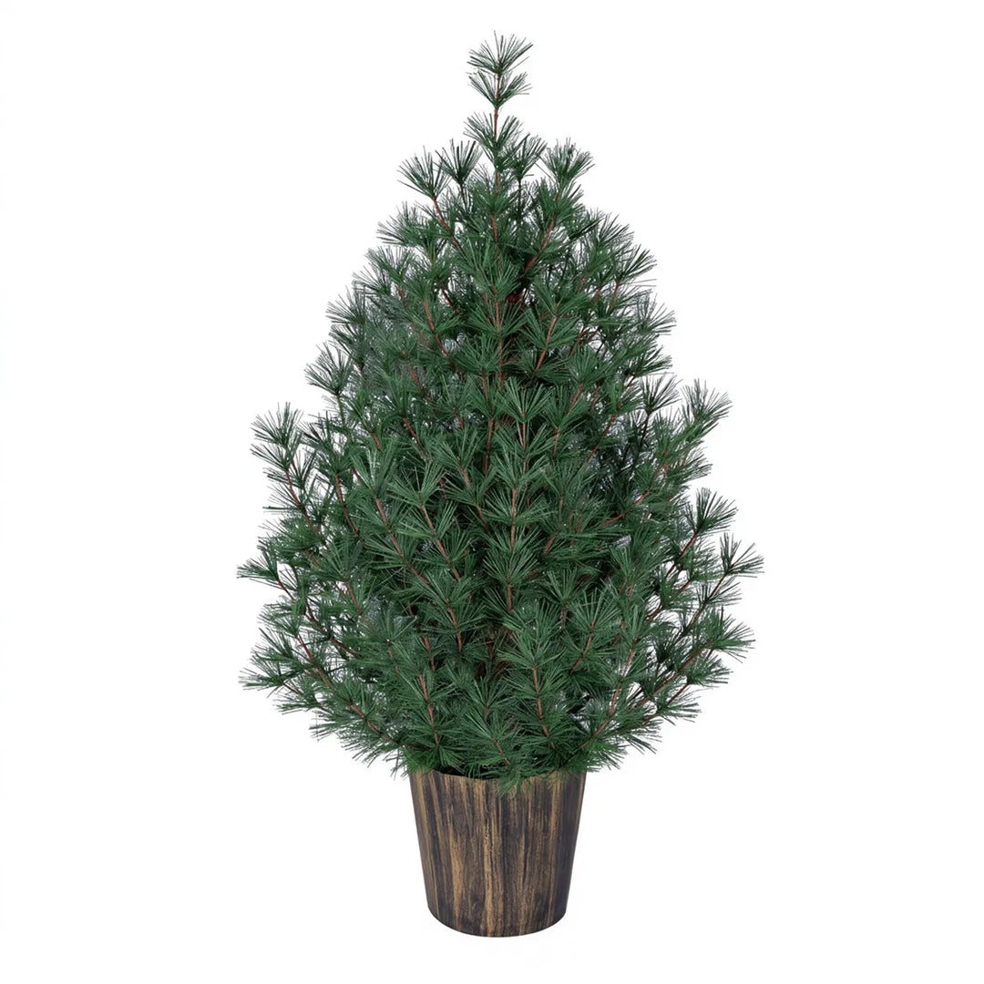 Liten julgran i guldfärgad kruka
