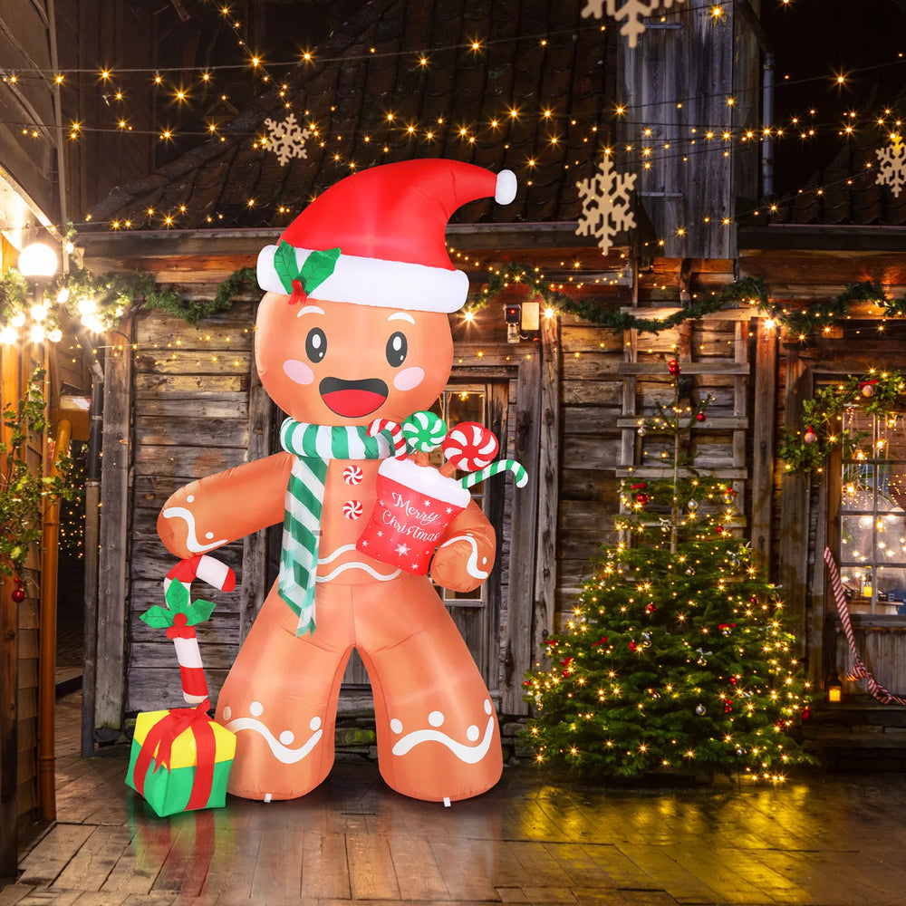 Uppblåsbar pepparkaksgubbe med polkagris