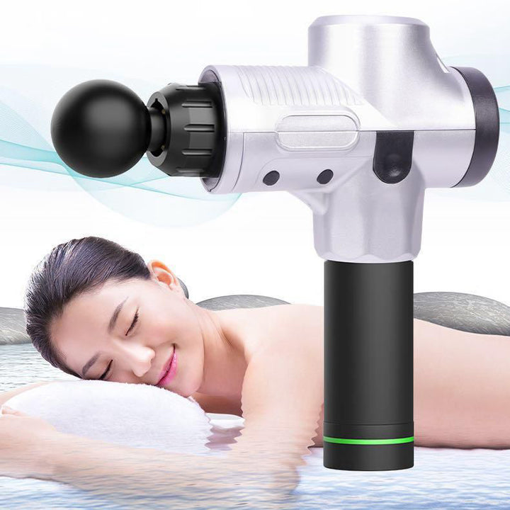 Massagepistol med utbytbara huvuden i väska