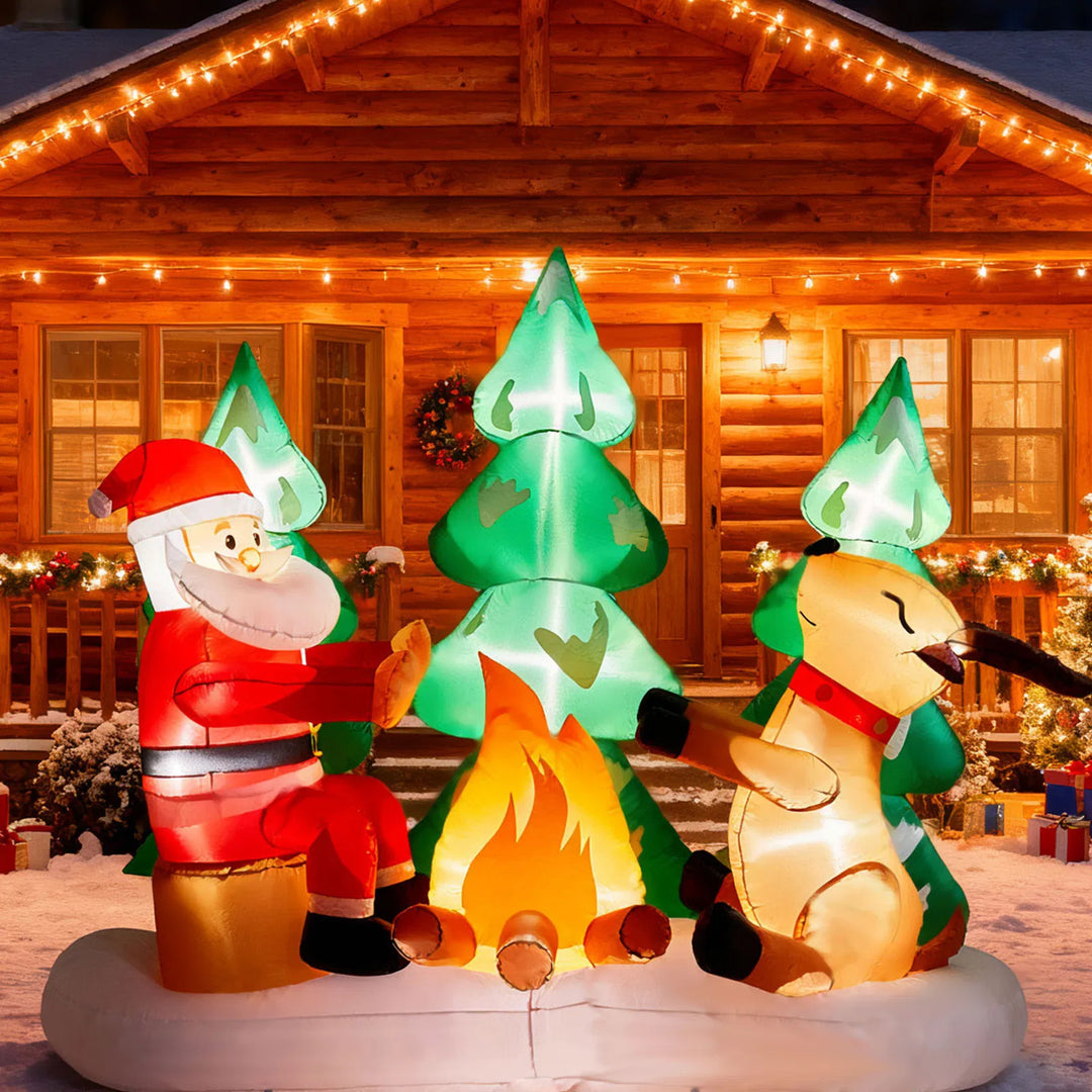 Uppblåsbar tomte och ren vid lägereld